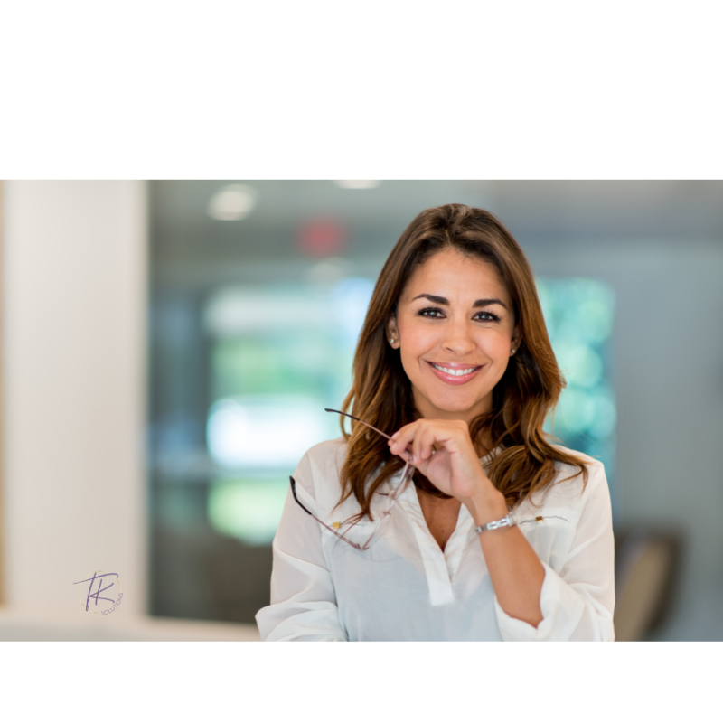 Confident female business owner representing financial clarity and leadership for growing service businesses